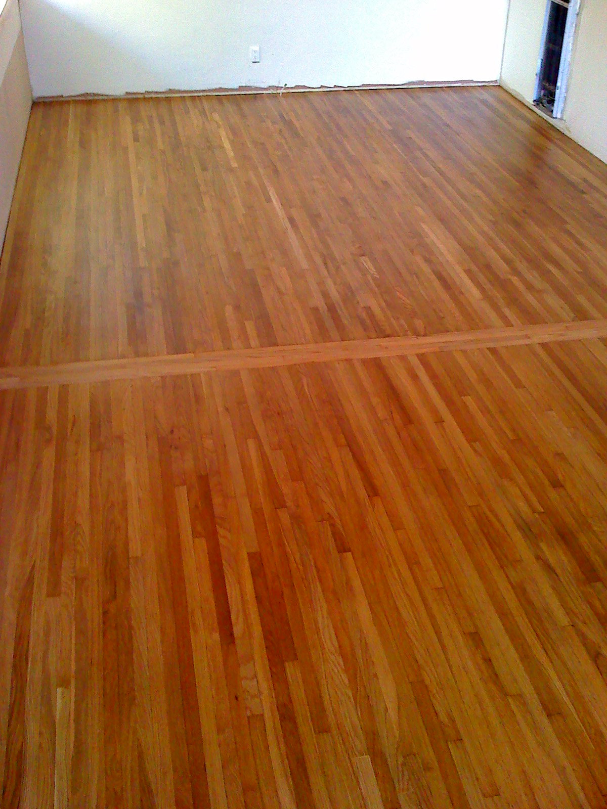 Hardwood floor refinishing and restoration in San Diego — project photo