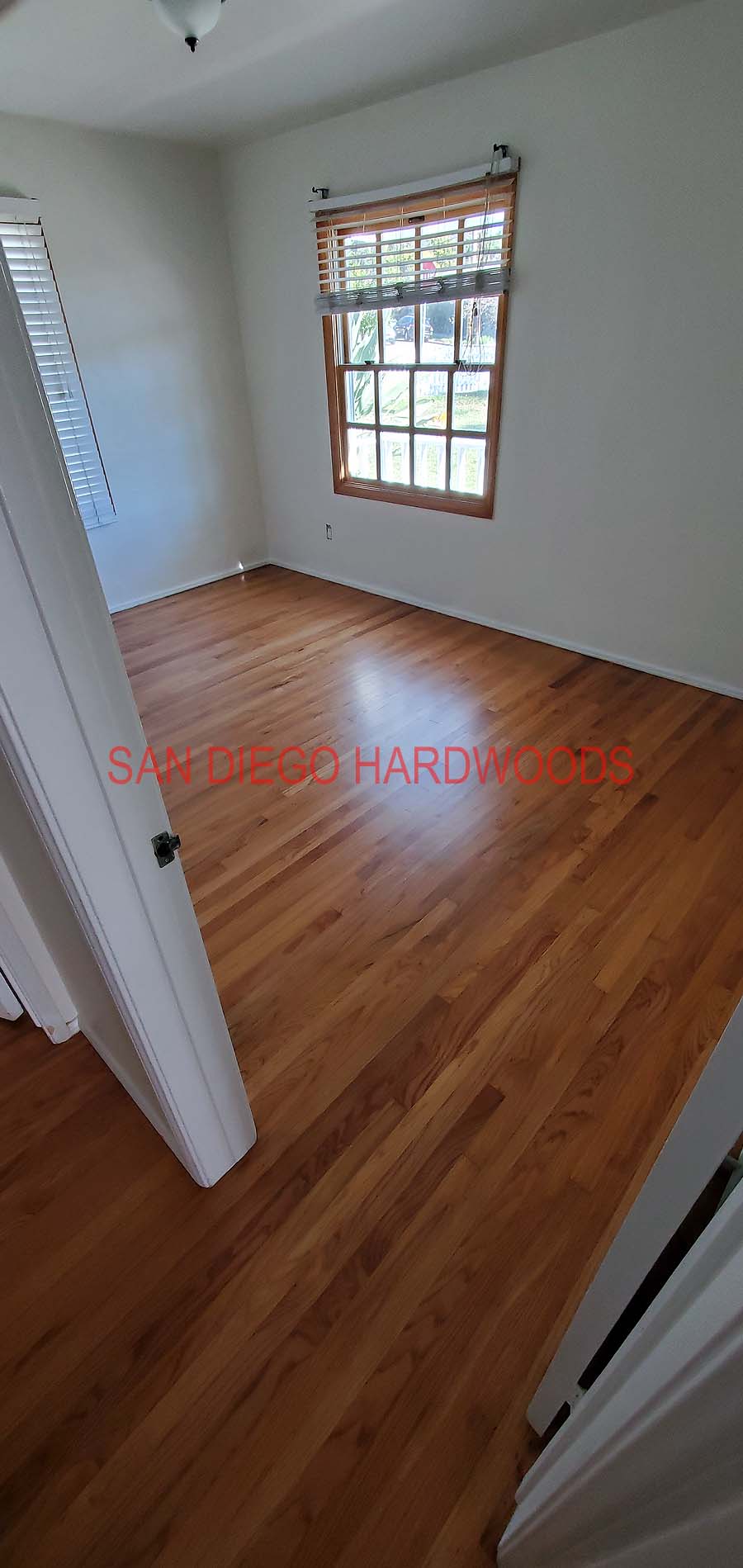Hardwood floor refinishing and restoration in San Diego — project photo