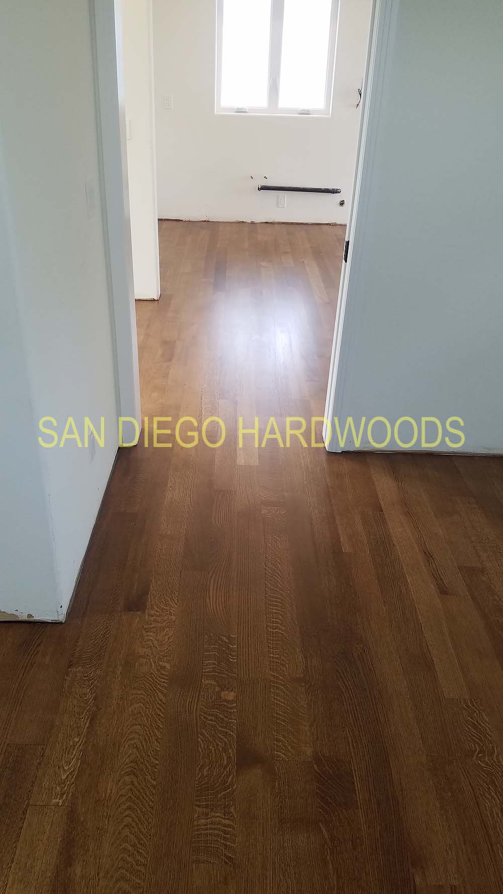 Hardwood floor refinishing and restoration in San Diego — project photo