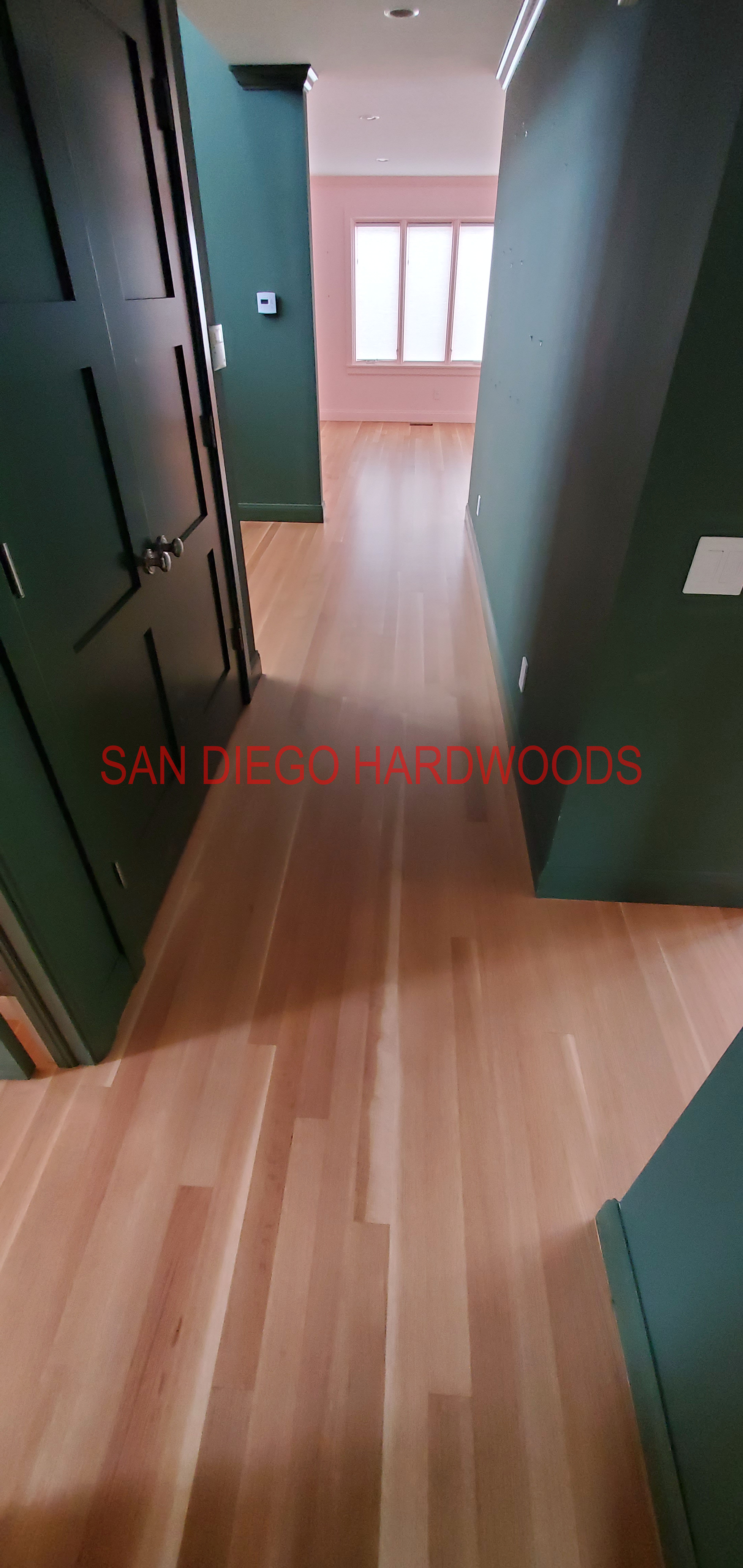 Hardwood floor refinishing and restoration in San Diego — project photo