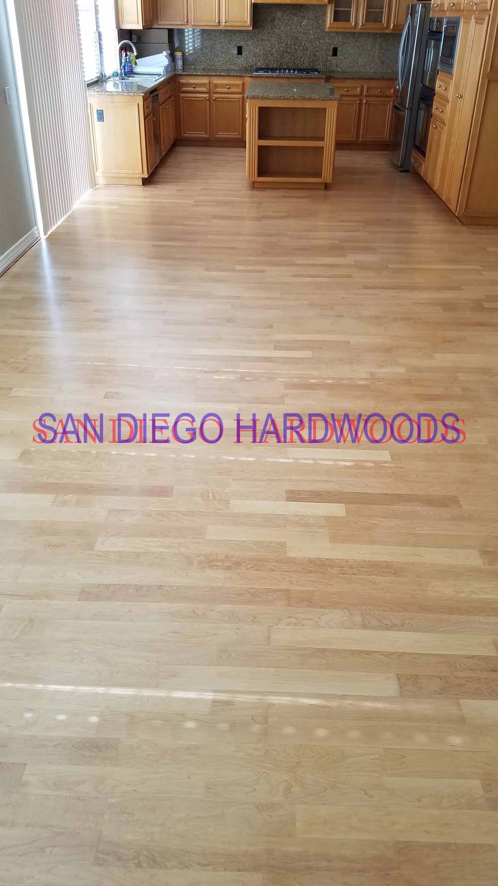 Hardwood floor refinishing and restoration in San Diego — project photo